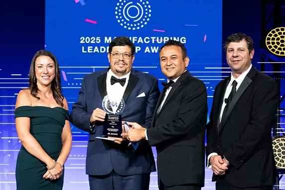 people holding flex mla award