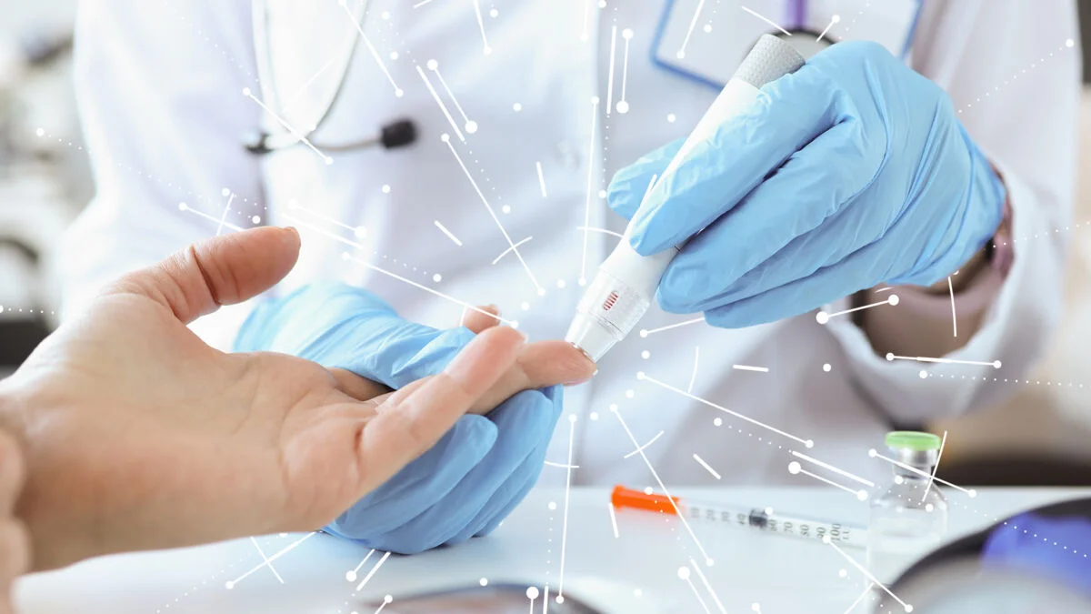 medical professional using a point of care device on patient