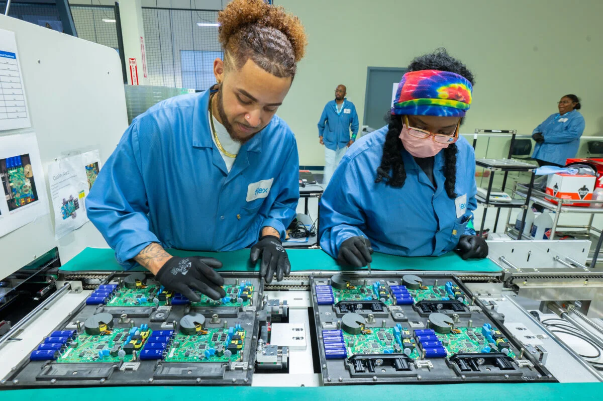 Two employees working on the line at Flex West Columbia, South Carolina manufacturing facility