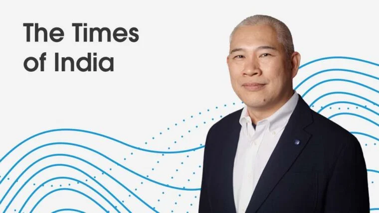 white image with blue lines, words The Times of India and Hooi Tan