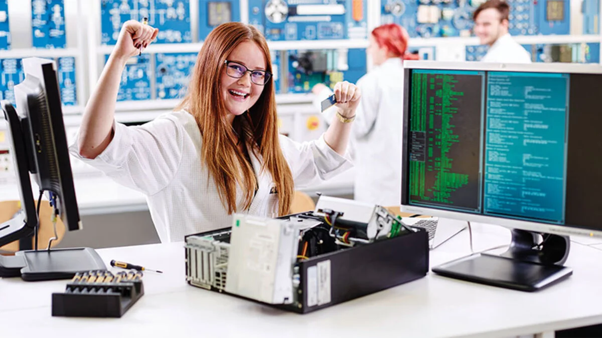 Female Flex IT apprentice working on a computer